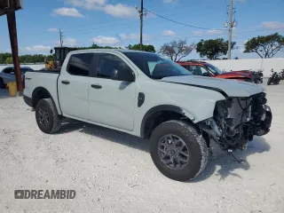 2024 Ford Ranger XLT with VIN 1FTER4GH7RLE74280, listed as a Copart auction lot 57282575 with 5,423 mi miles and Salvage title. Bid and sale history available at DreamBid. Image 4.