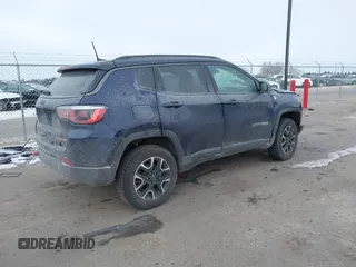 2020 Jeep Compass Trailhawk with VIN 3C4NJDDB3LT143926, listed as a IAAI auction lot 41368613 with 61,909 mi miles and . Bid and sale history available at carsss.com. Image 4.