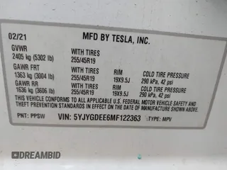 2021 Tesla Model Y Long Range with VIN 5YJYGDEE6MF122363, listed as a IAAI auction lot 41952018 with 54,263 mi miles and . Bid and sale history available at carsss.com. Image 9.