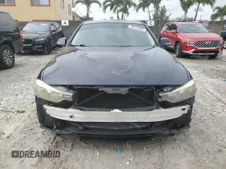 2012 BMW 3 Series 328i with VIN WBA3A5G51CNP17682, listed as a Copart auction lot 59619485 with 100,936 mi miles and Salvage title. Bid and sale history available at DreamBid. Image 5.