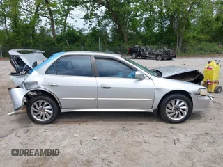 2002 Honda Accord SE z VIN 1HGCG56792A109226, wystawiony jako IAAI lot #42155995 z przebiegiem 238 789 mil mil oraz . Historia ofert i sprzedaży dostępna na DreamBid. Obrazek 13.