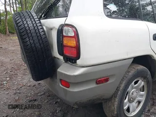 2000 Toyota RAV4 with VIN JT3GP10V0Y0051638, listed as a IAAI auction lot 42374740 with 270,258 mi miles and . Bid and sale history available at DreamBid. Image 13.
