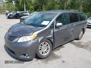 2015 Toyota Sienna XLE with VIN 5TDYK3DC3FS556859, listed as a IAAI auction lot 42161107 with 200,502 mi miles and . Bid and sale history available at DreamBid. Image 17.