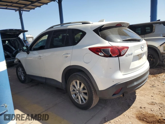 2015 Mazda CX-5 Touring with VIN JM3KE2CY2F0478167, listed as a Copart auction lot 52772805 with 135,492 mi miles and Salvage Title. Bid and sale history available at carsss.com. Image 2.