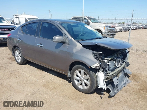 2012 Nissan Versa SV with VIN 3N1CN7AP8CL906636, listed as a IAAI auction lot 42007827 with 111,627 mi miles. Bid and sale history available at carsss.com. Image 1.