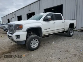 2016 GMC Sierra 3500HD Denali z VIN 1GT42YE84GF148264, wystawiony jako Copart lot #79954814 z przebiegiem 182 548 mil mil oraz Szkoda całkowita • Salvage title. Historia ofert i sprzedaży dostępna na DreamBid. Obrazek 1.