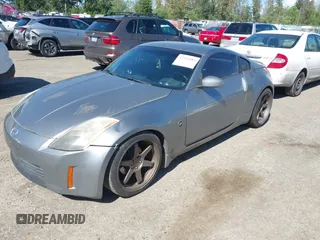 2003 Nissan 350Z Touring z VIN JN1AZ34E03T004458, wystawiony jako IAAI lot #42361684 z przebiegiem 147 847 mil mil oraz . Historia ofert i sprzedaży dostępna na DreamBid. Obrazek 2.