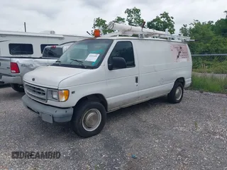 2000 Ford Econoline Cargo with VIN 1FTNE24L8YHB14204, listed as a IAAI auction lot 42151691 with 240,475 mi miles and . Bid and sale history available at DreamBid. Image 2.