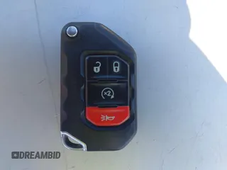 2022 Jeep Gladiator Willys Sport z VIN 1C6HJTAG0NL180848, wystawiony jako IAAI lot #41778129 z przebiegiem Nie podano mil oraz . Historia ofert i sprzedaży dostępna na DreamBid. Obrazek 11.