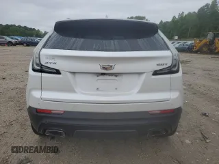 2019 Cadillac XT4 FWD Sport z VIN 1GYFZER49KF199885, wystawiony jako Copart lot #56836895 z przebiegiem 58 486 mil mil oraz Szkoda całkowita • Salvage title. Historia ofert i sprzedaży dostępna na DreamBid. Obrazek 6.