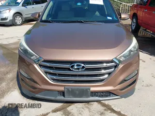 2016 Hyundai Tucson Limited with VIN KM8J33A25GU074798, listed as a IAAI auction lot 42103566 with 143,777 mi miles and . Bid and sale history available at carsss.com. Image 12.
