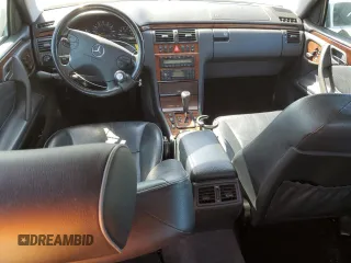2000 Mercedes-Benz E-Class with VIN WDBJF65J4YB159268, listed as a Copart auction lot 50923115 with 127,650 mi miles and Salvage Title. Bid and sale history available at carsss.com. Image 8.