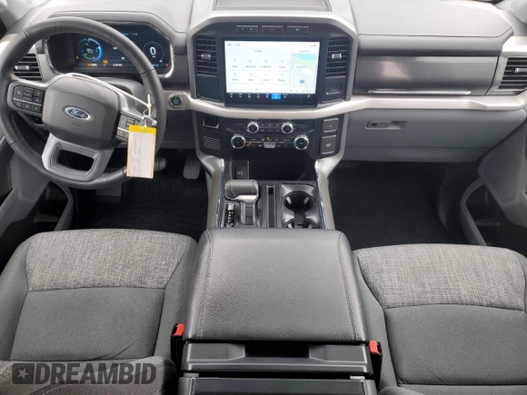 2023 Ford F-150 Lightning Pro with VIN 1FT6W1EV8PWG38071, listed as a Copart auction lot 51091495 with 13,687 mi miles and Salvage title. Bid and sale history available at DreamBid. Image 8.