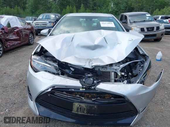 2018 Toyota Corolla L with VIN 2T1BURHE7JC038172, listed as a IAAI auction lot 42473864 with 83,657 mi miles and . Bid and sale history available at DreamBid. Image 12.