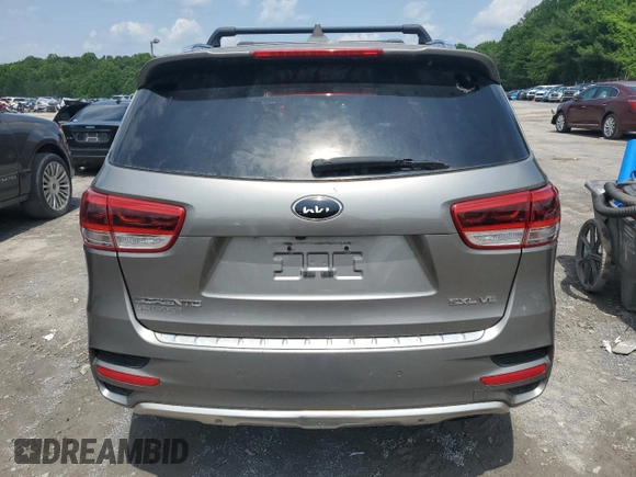 2016 Kia Sorento SX with VIN 5XYPKDA51GG092864, listed as a Copart auction lot 60426365 with 151,599 mi miles and Clean title. Bid and sale history available at DreamBid. Image 6.