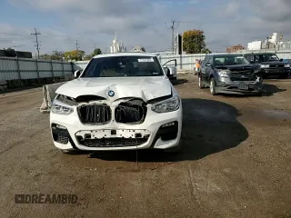 2019 BMW X4 xDrive30i with VIN 5UXUJ3C5XKLG54286, listed as a Copart auction lot 77333284 with 99,771 mi miles and Salvage Title. Bid and sale history available at carsss.com. Image 12.