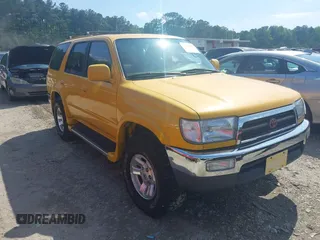 1996 Toyota 4Runner SR5 z VIN JT3GN86R3T0004069, wystawiony jako IAAI lot #42277253 z przebiegiem 300 768 mil mil oraz . Historia ofert i sprzedaży dostępna na DreamBid. Obrazek 1.