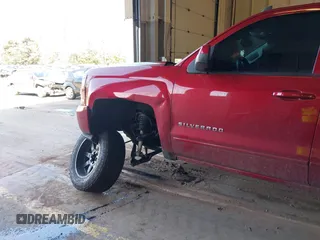 2018 Chevrolet Silverado 1500 LT with VIN 3GCUKREC0JG580317, listed as a IAAI auction lot 41868522 with 75,738 mi miles. Bid and sale history available at carsss.com. Image 6.