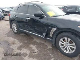 2014 Infiniti QX70 z VIN JN8CS1MU6EM450640, wystawiony jako IAAI lot #42335811 z przebiegiem 143 565 mil mil oraz . Historia ofert i sprzedaży dostępna na DreamBid. Obrazek 6.