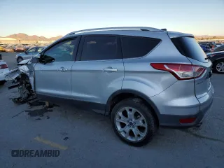 2016 Ford Escape Titanium with VIN 1FMCU9J95GUA69932, listed as a Copart auction lot 88470175 with 108,471 mi miles and Salvage title. Bid and sale history available at DreamBid. Image 2.