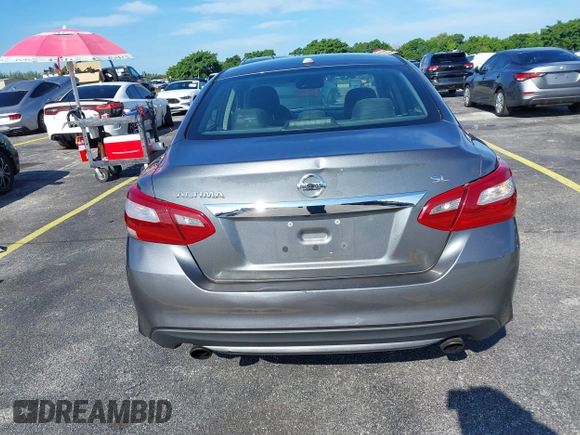 2018 Nissan Altima SR with VIN 1N4AL3APXJC170428, listed as a IAAI auction lot 40355309 with Not Provided miles and . Bid and sale history available at carsss.com. Image 14.