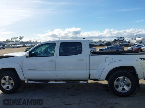 2015 Toyota Tacoma PreRunner with VIN 3TMKU4HN6FM044238, listed as a IAAI auction lot 41534623 with 196,490 mi miles and . Bid and sale history available at DreamBid. Image 14.