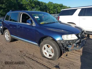 2004 Volkswagen Touareg z VIN WVGBC67L34D031062, wystawiony jako IAAI lot #39559679 z przebiegiem Nie podano mil oraz . Historia ofert i sprzedaży dostępna na DreamBid. Obrazek 1.
