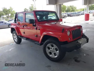2014 Jeep Wrangler Unlimited Sahara z VIN 1C4BJWEGXEL179054, wystawiony jako IAAI lot #42151597 z przebiegiem 151 810 mil mil oraz . Historia ofert i sprzedaży dostępna na DreamBid. Obrazek 1.