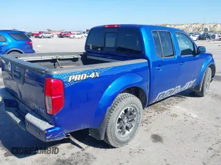 2014 Nissan Frontier SV with VIN 1N6AD0EV4EN720325, listed as a IAAI auction lot 41479133 with 61,661 mi miles and . Bid and sale history available at DreamBid. Image 4.