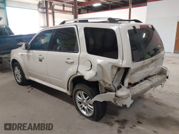 2009 Mercury Mariner Premier with VIN 4M2CU97729KJ00086, listed as a IAAI auction lot 41418490 with 167,486 mi miles. Bid and sale history available at carsss.com. Image 3.
