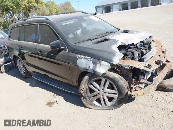 2014 Mercedes-Benz GL 450 with VIN 4JGDF7CE1EA404163, listed as a IAAI auction lot 40596433 with Not provided miles and . Bid and sale history available at DreamBid. Image 1.