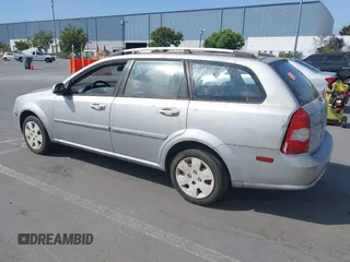 2006 Suzuki Forenza z VIN KL5JD86Z06K325179, wystawiony jako IAAI lot #42507357 z przebiegiem Nie podano mil oraz . Historia ofert i sprzedaży dostępna na DreamBid. Obrazek 3.