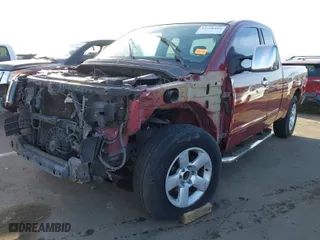 2004 Nissan Titan XE with VIN 1N6AA06A24N584067, listed as a IAAI auction lot 41568800 with 184,664 mi miles. Bid and sale history available at carsss.com. Image 6.