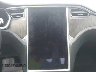2013 Tesla Model S с VIN 5YJSA1CN4DFP26552, выставлен на аукционе IAAI как лот 42370183 с пробегом Не указан миль и . История ставок и продаж доступна на DreamBid. Изображение 16.