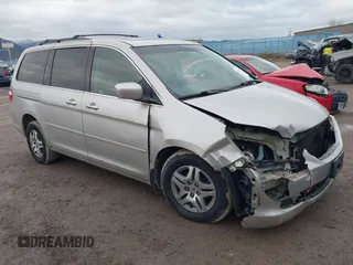 2005 Honda Odyssey EX-L with VIN 5FNRL38675B505695, listed as a IAAI auction lot 40931430 with 337,403 mi miles. Bid and sale history available at carsss.com. Image 1.