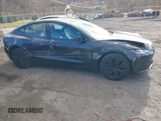 2024 Tesla Model 3 with VIN 5YJ3E1EA9RF843196, listed as a IAAI auction lot 40822399 with 4,937 mi miles. Bid and sale history available at carsss.com. Image 1.