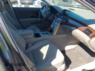 2007 Acura RL Tech Pkg with VIN JH4KB16647C002703, listed as a IAAI auction lot 41882614 with 174,713 mi miles. Bid and sale history available at carsss.com. Image 5.