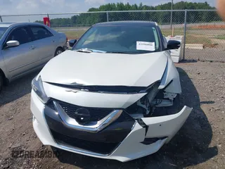 2017 Nissan Maxima S with VIN 1N4AA6APXHC371182, listed as a IAAI auction lot 42596000 with 159,710 mi miles and . Bid and sale history available at DreamBid. Image 12.