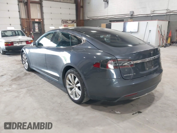 2016 Tesla Model S 90D with VIN 5YJSA1E22GF124109, listed as a IAAI auction lot 42487466 with 83,593 mi miles and . Bid and sale history available at DreamBid. Image 3.