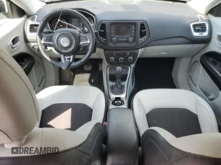 2017 Jeep Compass Latitude with VIN 3C4NJCBB0HT611440, listed as a Copart auction lot 57401485 with 128,319 mi miles and Salvage title. Bid and sale history available at DreamBid. Image 8.