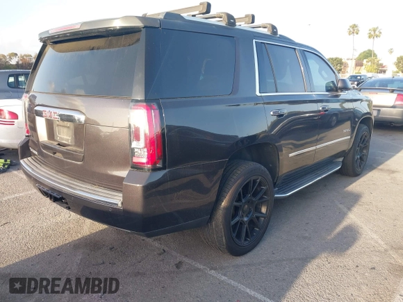 2015 GMC Yukon Denali z VIN 1GKS1CKJ7FR566419, wystawiony jako IAAI lot #41948825 z przebiegiem 235 037 mil mil oraz . Historia ofert i sprzedaży dostępna na DreamBid. Obrazek 4.