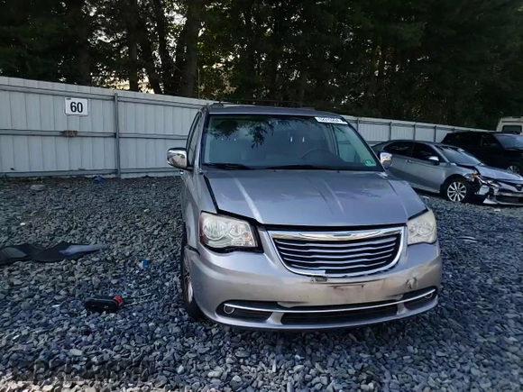 2014 Chrysler Town & Country Touring L with VIN 2C4RC1CG8ER469430, listed as a Copart auction lot 62019264 with 125,241 mi miles and Salvage Title. Bid and sale history available at DreamBid. Image 12.