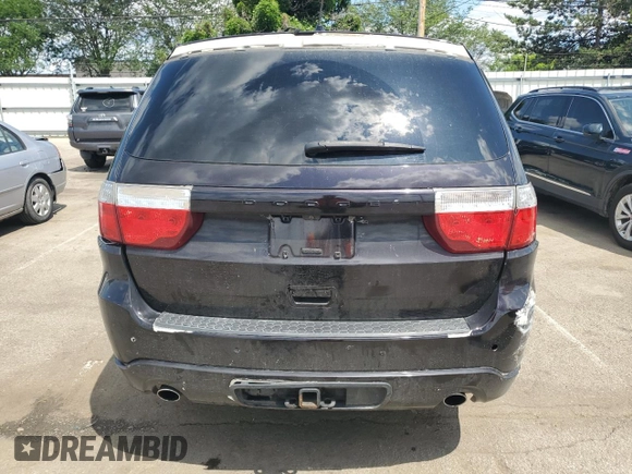 2013 Dodge Durango R/T with VIN 1C4SDJCT1DC672338, listed as a Copart auction lot 61544445 with 203,404 mi miles and Salvage title. Bid and sale history available at DreamBid. Image 6.