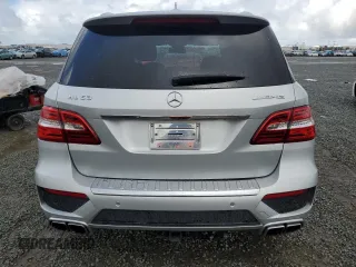 2015 Mercedes-Benz M 63 AMG with VIN 4JGDA7EB7FA504173, listed as a Copart auction lot 47596605 with 114,001 mi miles and Salvage Title. Bid and sale history available at carsss.com. Image 6.