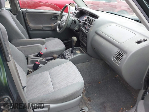 2002 Chevrolet Tracker z VIN 2CNBJ13C126946857, wystawiony jako IAAI lot #41491975 z przebiegiem Nie podano mil oraz . Historia ofert i sprzedaży dostępna na DreamBid. Obrazek 5.