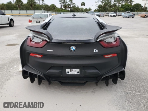 2015 BMW i8 z VIN WBY2Z2C56FV392042, wystawiony jako Copart lot #66972874 z przebiegiem Nie podano mil oraz Szkoda całkowita • Salvage title. Historia ofert i sprzedaży dostępna na DreamBid. Obrazek 6.