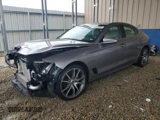 2023 Genesis G70 2.0T with VIN KMTG34TA0PU125859, listed as a Copart auction lot 65530425 with 37,324 mi miles and Salvage title. Bid and sale history available at DreamBid. Image 1.