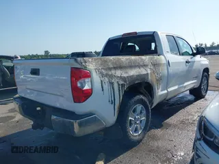 2019 Toyota Tundra SR with VIN 5TFRM5F13KX139638, listed as a IAAI auction lot 42682170 with 112,278 mi miles and . Bid and sale history available at DreamBid. Image 4.