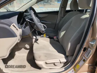2012 Toyota Corolla L with VIN 5YFBU4EE6CP051067, listed as a Copart auction lot 52988715 with 816,251 mi miles and Salvage Title. Bid and sale history available at DreamBid. Image 7.