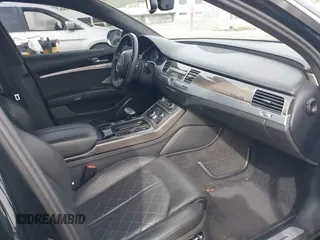 2013 Audi S8 with VIN WAUD2AFD0DN028673, listed as a IAAI auction lot 41689320 with 115,502 mi miles. Bid and sale history available at carsss.com. Image 5.